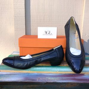 Navy Leather Flats With a Patent Leather Toe